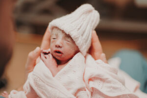 bundled newborn baby